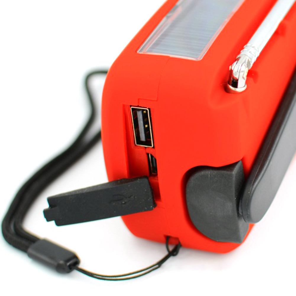 Solar energy hand-held emergency radio flashlight